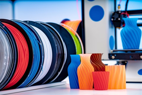 3D Printer filament in various colors and 3D Printed Objects